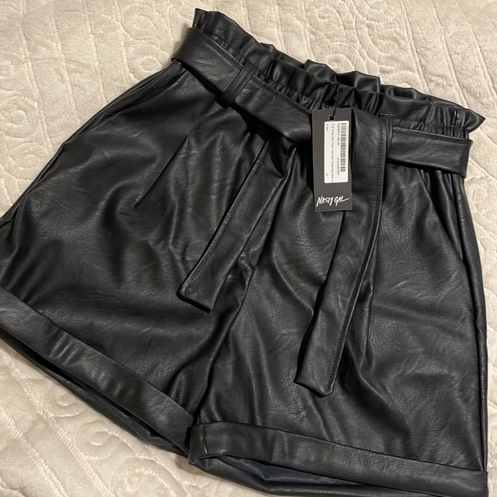 High waisted faux leather shorts with tie. New w/tags